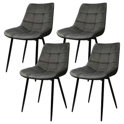 Four dark gray upholstered dining chairs with black metal legs are arranged in a studio setting against a white background.
