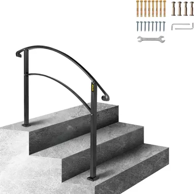 A black metal handrail installed on outdoor concrete steps.