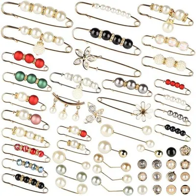 Immagine prodotto di Set di chiodini decorativi - 50 pezzi di perline finte e chiodini rivestiti - Ideale per decorare i capi di abbigliamento