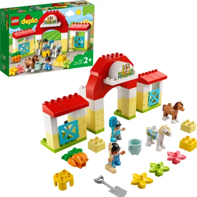 Produktbild von LEGO 10951 DUPLO Pferdestall und Ponypflege Spielzeug für Kleinkinder ab 2 Jahren, Bauernhof, Spielset mit Figuren: Pferd und Reiter