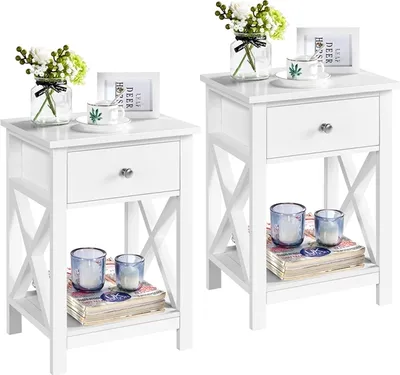 Two white bedside tables are shown side-by-side against a white background.