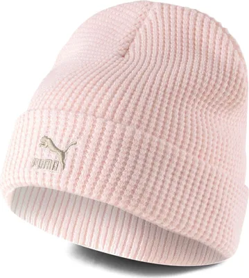 A close-up studio shot of a pink Puma beanie.