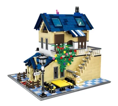 A model of a French country house made of building blocks.