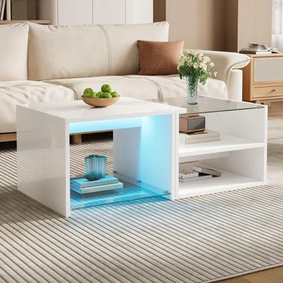 Imagen del producto de Mesa de centro Merax con acabado brillante y diseño escalonado, mesa auxiliar para sofá con iluminación LED, mesa de centro para sala de estar con superficie de vidrio y compartimentos abiertos, fabricada en aglomerado, color blanco