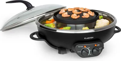 A multi-functional cooking appliance with a hot pot and grill plate, shown on a white background.