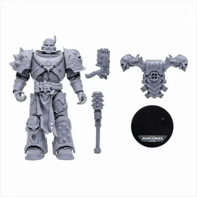 A grey plastic model kit of a Warhammer 40k Chaos Space Marine action figure with accessories, laid out on a white background.