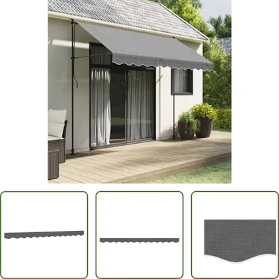 An awning is installed on the side of a house, extending over a wooden deck.