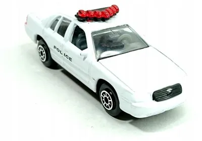 Obrázek produktu pro Kovový model policejního vozu Ford Crown Victoria, rok výroby 1999, značka Welly
