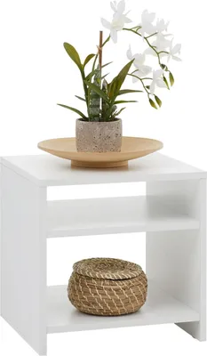 A white side table with two shelves, decorated with a potted orchid and a woven basket.
