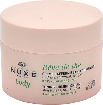 A pink jar of NUXE body toning firming cream with green text.