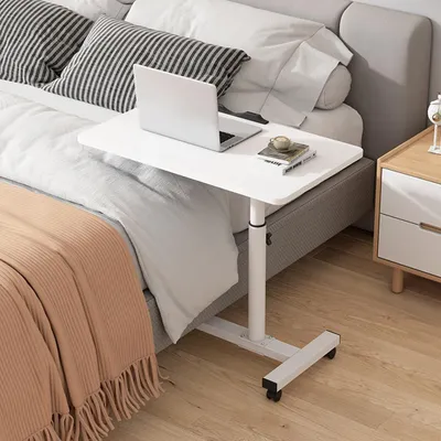 Image de Table d'appoint réglable sur hauteur, montée sur roulettes, de couleur blanche