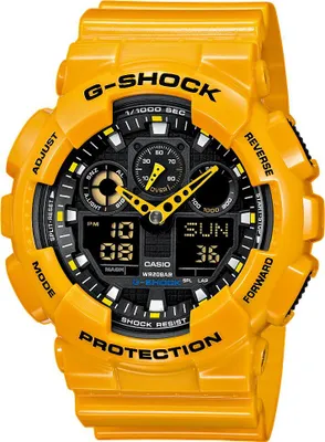 A bright yellow Casio G-Shock watch is shown against a white background.