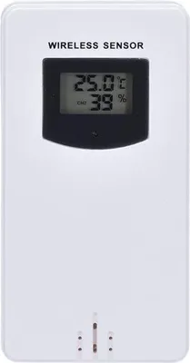 A white wireless sensor with a digital display showing temperature and humidity.