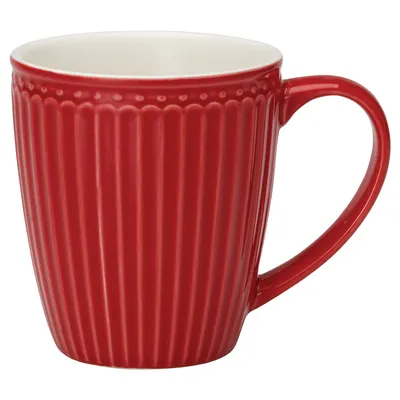 A red mug with a white interior is shown against a white background.