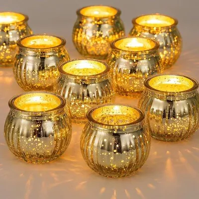 Productafbeelding van Unyqoos® Set van 12 ribbelglazen theelichthouders in pompoenontwerp, goudkleurig, 5,3 x 6,3 cm – geschikt voor standaard theelichthouders met een diameter van 3,8 cm, kaarsen en LED-kaarsen