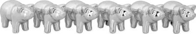 A row of small, silver-colored pig figurines.