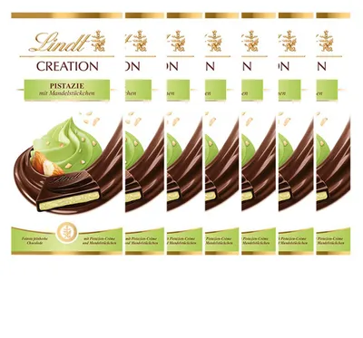Produktbild von Lindt Creation Pistazie Schokolade mit Mandelstückchen 148g 7er Pack