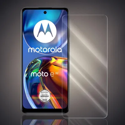 A screen protector is shown placed over a Motorola Moto E32 smartphone.