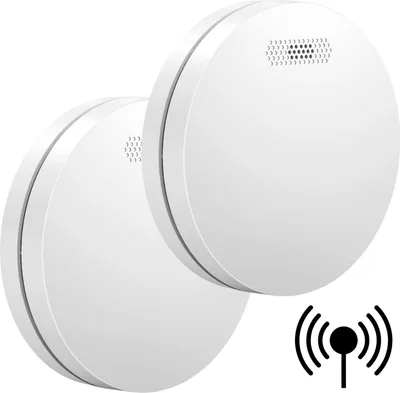 Two white smoke detectors are shown against a white background.