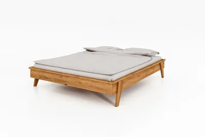 Produktbild von Bett Jetro 3 aus Wildeiche massiv 140x200 cm ohne Kopfteil mit Holzbeinen