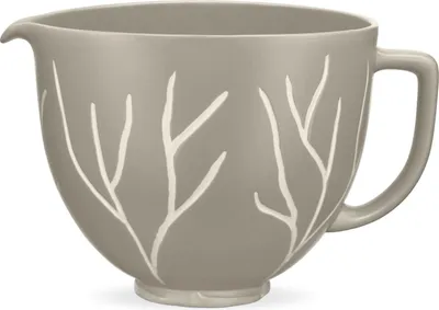 A gray ceramic mixing bowl with a white tree branch pattern, shown against a white background.