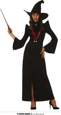 A woman dressed in a witch costume holding a wand.