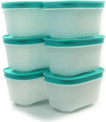 A stack of six white and mint green food storage containers with lids.