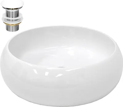 A white ceramic washbasin with a drain assembly.