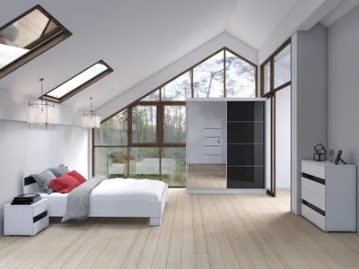 A modern bedroom with a bed, wardrobe, and nightstand, featuring large windows with a forest view.