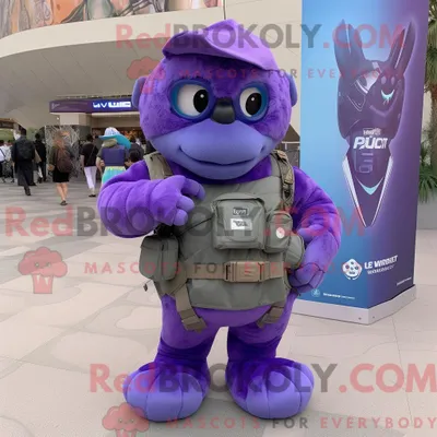 Immagine prodotto di Personaggio mascotte REDBROKOLY di un soldato viola dell aeronautica militare vestito con una maglietta con scollo a V e zaini