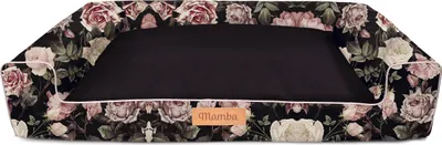 A dog bed with a floral pattern.