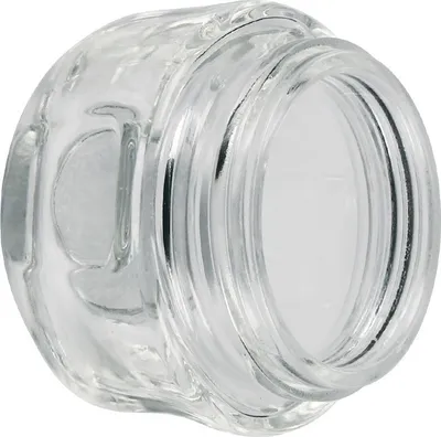 A close-up, isolated shot of a clear glass lamp cover.