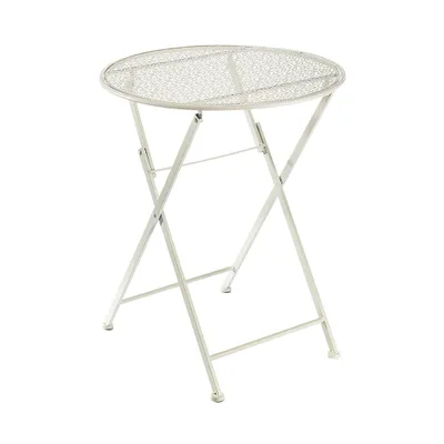 A cream-colored metal bistro table with a round, perforated top and folding legs, presented against a white background.
