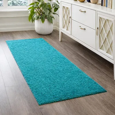 Produktbild von Shaggy Teppich in Türkis für Wohnzimmer und Schlafzimmer – weich, frisch und stilvoll Größe - 60 x 110 cm