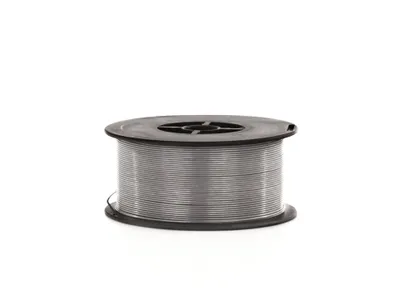 A spool of welding wire on a white background.