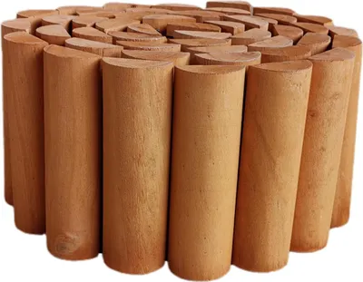 A coiled arrangement of wooden border segments.