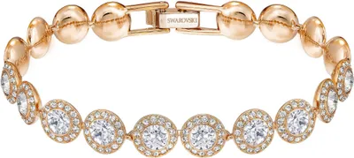 A close-up studio shot of a gold-toned bracelet with clear crystals.