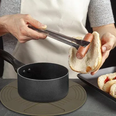 Produktbild von Famanu Hitzebeständige Silikonuntersetzer für Töpfe und Pfannen - 28 cm