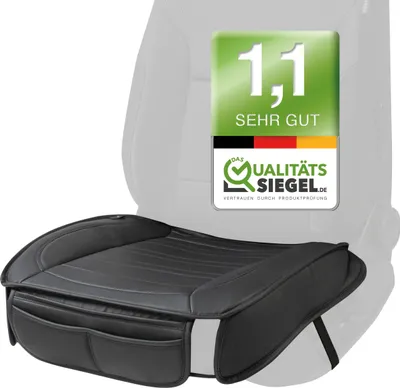 A black car seat cover is shown in front of a grey car seat. A green and white badge with German flag colors is overlaid on the upper right side of the image.