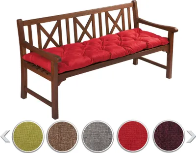 A wooden bench with a red cushion on it, with color swatches below.