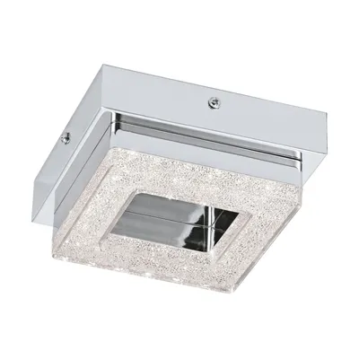 A square, modern ceiling light with a chrome finish and a crystal-like diffuser.