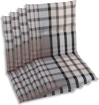 A stack of four chair cushions with a plaid pattern.
