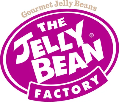 A logo for The Jelly Bean Factory, featuring the brand name in large white letters on a magenta oval background, with the tagline "Gourmet Jelly Beans" above it.