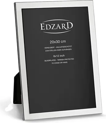 A silver-plated picture frame with text on the black insert.