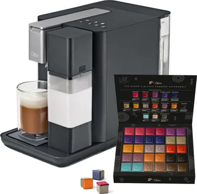 Produktbild von Tchibo Qbo MILK MASTER Premium Kapselmaschine inkl. 30 recyclebare Qbo Kapseln für Cappuccino, Espresso, Caffè Crema, Milchschaum auf Knopfdruck mit abnehmbarem Milchtank 300ml, Gentle Grey