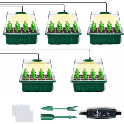 A set of five mini greenhouses with seedlings under grow lights, along with gardening tools and markers.