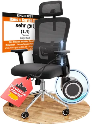 A black office chair is shown on a wooden floor, with a marketing graphic in the background and a red tag attached to the chair.