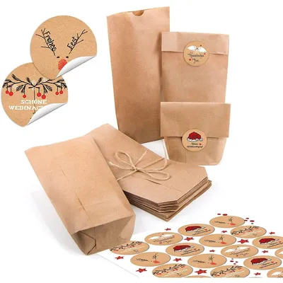 Produktbild von 24 kleine braune Papiertüten natur Kraftpapier 10,7 x 22 x 4,2 cm + 24 runde Aufkleber Frohe Weihnachten schwarz weiß rot Verpackung Geschenk mini-Tüte"Frohe Weihnachten" schwarz, weiß, rot