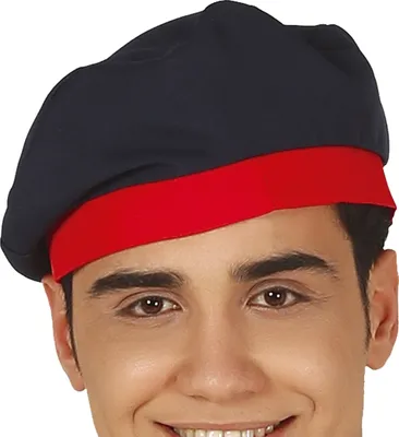 A close-up of a person wearing a blue and red beret.