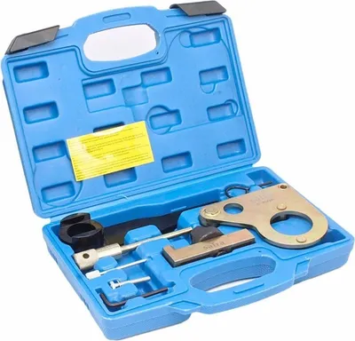 A blue plastic case containing a set of engine timing tools.